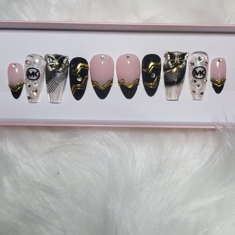 Michael Kors Inspired Nail Stickers – 30 Pieces (7 Colours)
Part of our Nail Sticker Collection, these stylish Michael Kors designer-inspired nail stickers make it easy to spice up your nails at home—no salon needed. Perfect for natural or acrylic nails, they can also be applied over regular polish, gel, or shellac. Handmade with care, these stickers are great for creating chic nail art or adding flair to fun DIY projects.