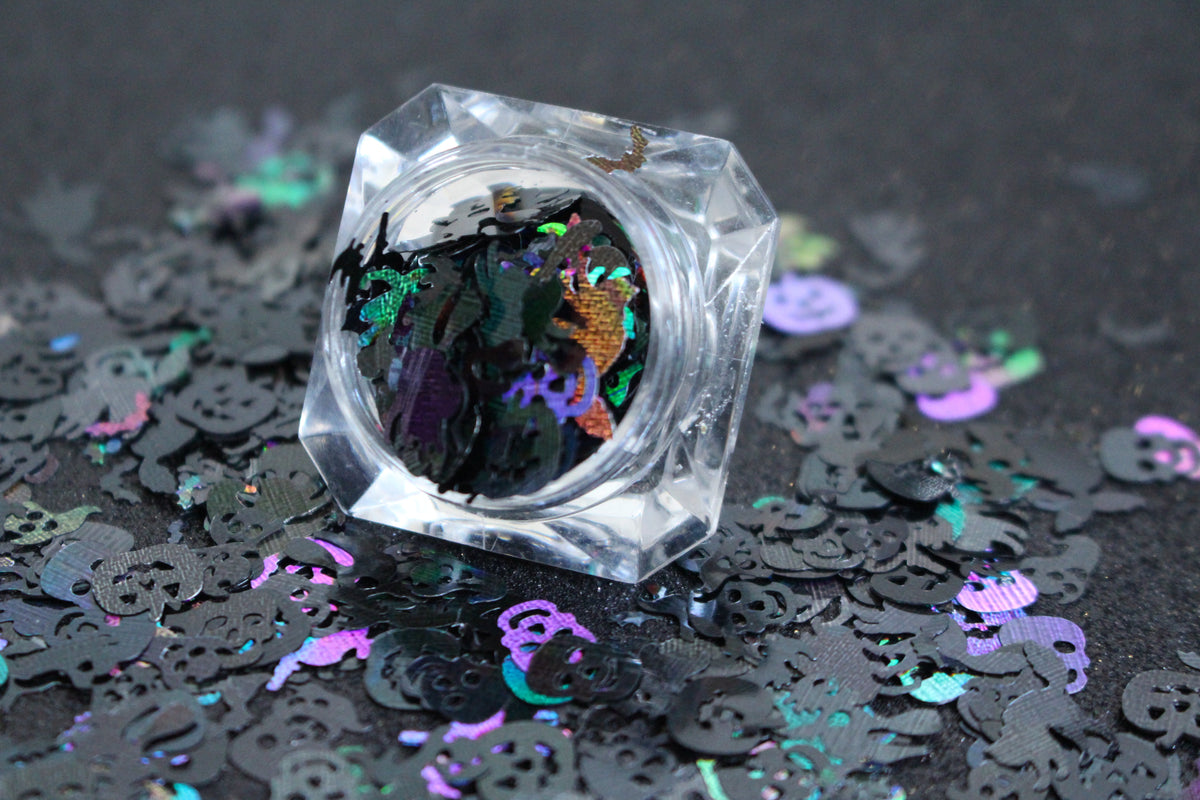 Halloween Mix β Premium Holographic Black Glitter Shapes
Get ready to haunt your look with this eerie blend from our Halloween Collection! Featuring spooky 8mm pumpkins and skulls, 10mm ghosts, 12mm black cats, 6mm bats, and towering 16mm witches, this holographic black mix is perfect for wickedly fun nail art and glitter slime.
Available in 5g jars only.