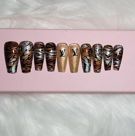 Louis Vuitton Inspired Nail Stickers – 30 Pieces (5 Colours)
No need to visit the nail salon—spice up your nails at home with these chic Louis Vuitton designer-inspired nail stickers. Perfect for natural or acrylic nails, you can apply them over regular polish, gel, or shellac. 
Handmade with care, these stickers are great for creating chic nail art or adding flair to fun DIY projects.
🌟 Glam Tip: Apply some of our glitter on your nails to really GLAMOUREYES your look.