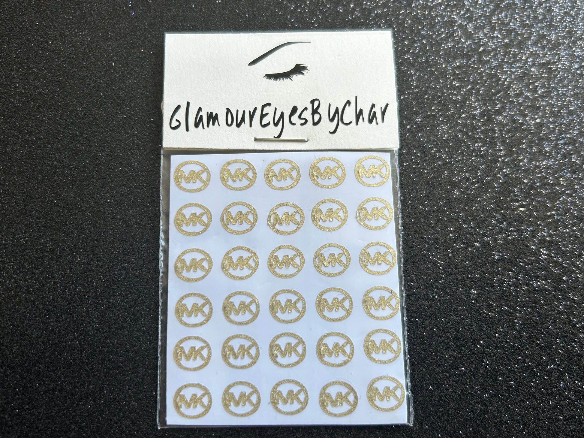 Michael Kors Inspired Nail Stickers – 30 Pieces (7 Colours)
Part of our Nail Sticker Collection, these stylish Michael Kors designer-inspired nail stickers make it easy to spice up your nails at home—no salon needed. Perfect for natural or acrylic nails, they can also be applied over regular polish, gel, or shellac. Handmade with care, these stickers are great for creating chic nail art or adding flair to fun DIY projects.