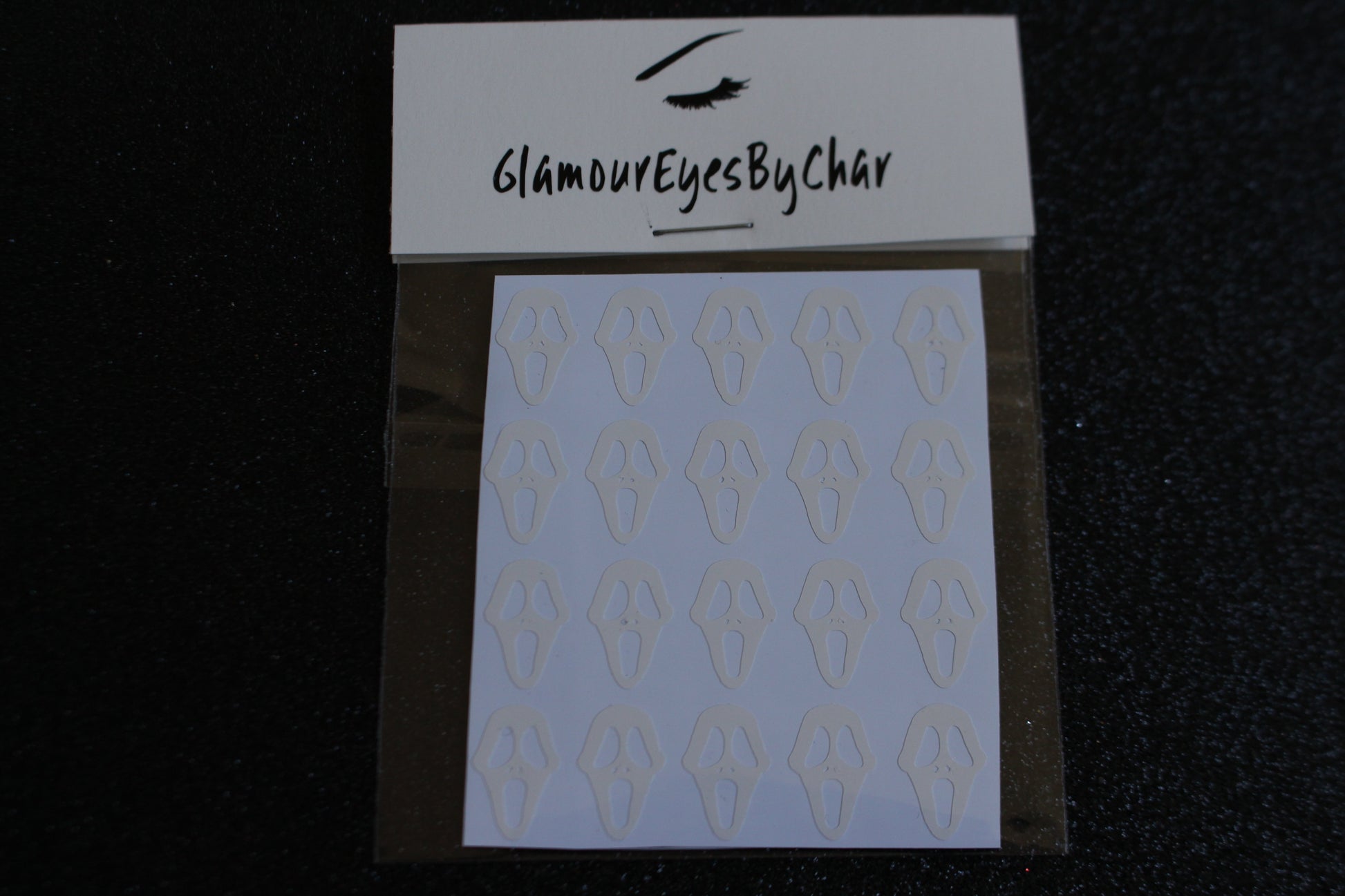 Ghostface Inspired Nail Stickers – 40 Pieces (2 Sheets)
Part of our Halloween Collection, the screams are getting louder this spooky season 🎃👻. Skip the salon and slash your nail game at home with these eerie Ghostface inspired nail stickers. Perfect for natural or acrylic nails, they’re easy to apply over regular polish, gel, or shellac. Handmade with care, these stickers bring serious horror vibes to your Halloween look — and are also fun for creepy crafts or DIY projects.
Each pack includes 40 sticker