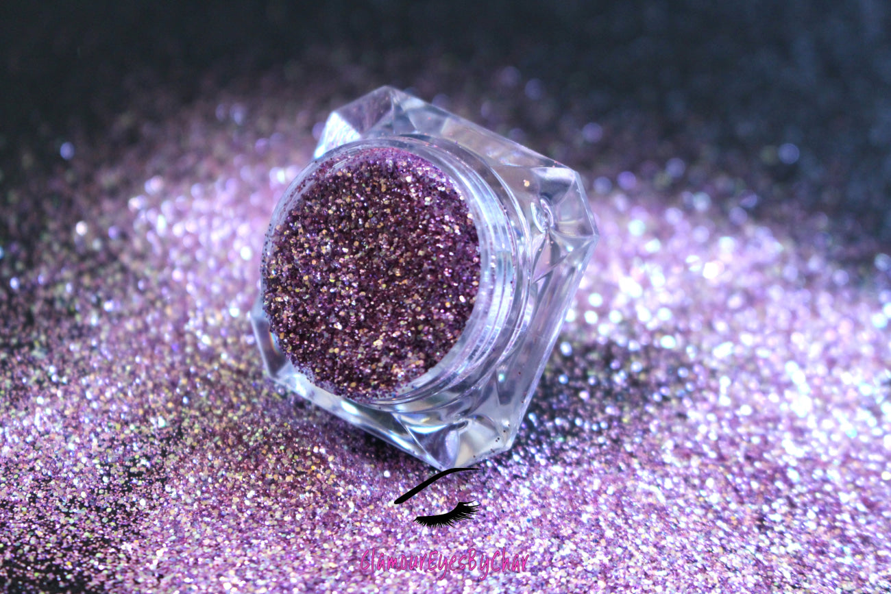 This premium glitter is part of the simple glitter collection. It consists of purple glitter with a touch of gold dazzling sparkle. Pink Champagne can be used for your face, hair, body, nail art and glitter slime.