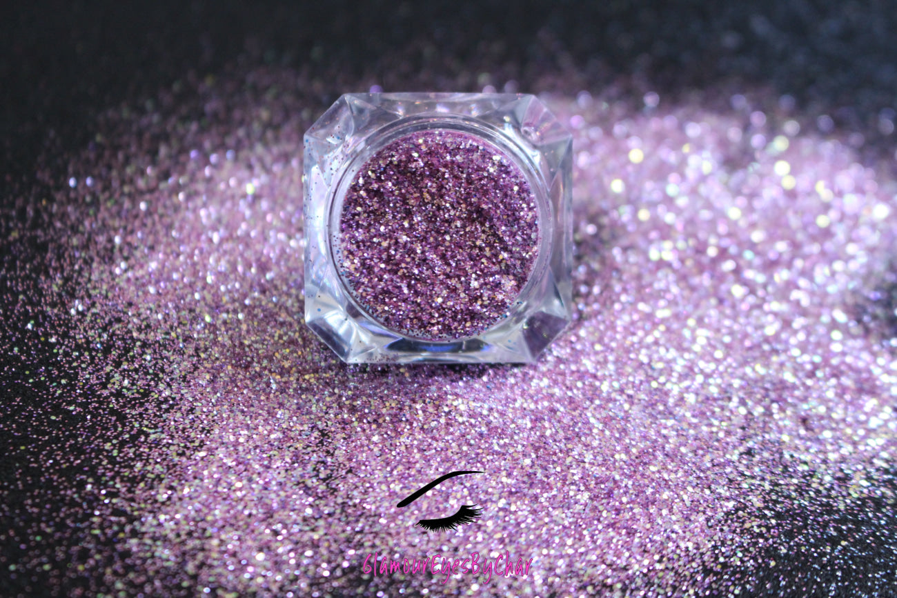  This premium glitter is part of the simple glitter collection. It consists of purple glitter with a touch of gold dazzling sparkle. Pink Champagne can be used for your face, hair, body, nail art and glitter slime.