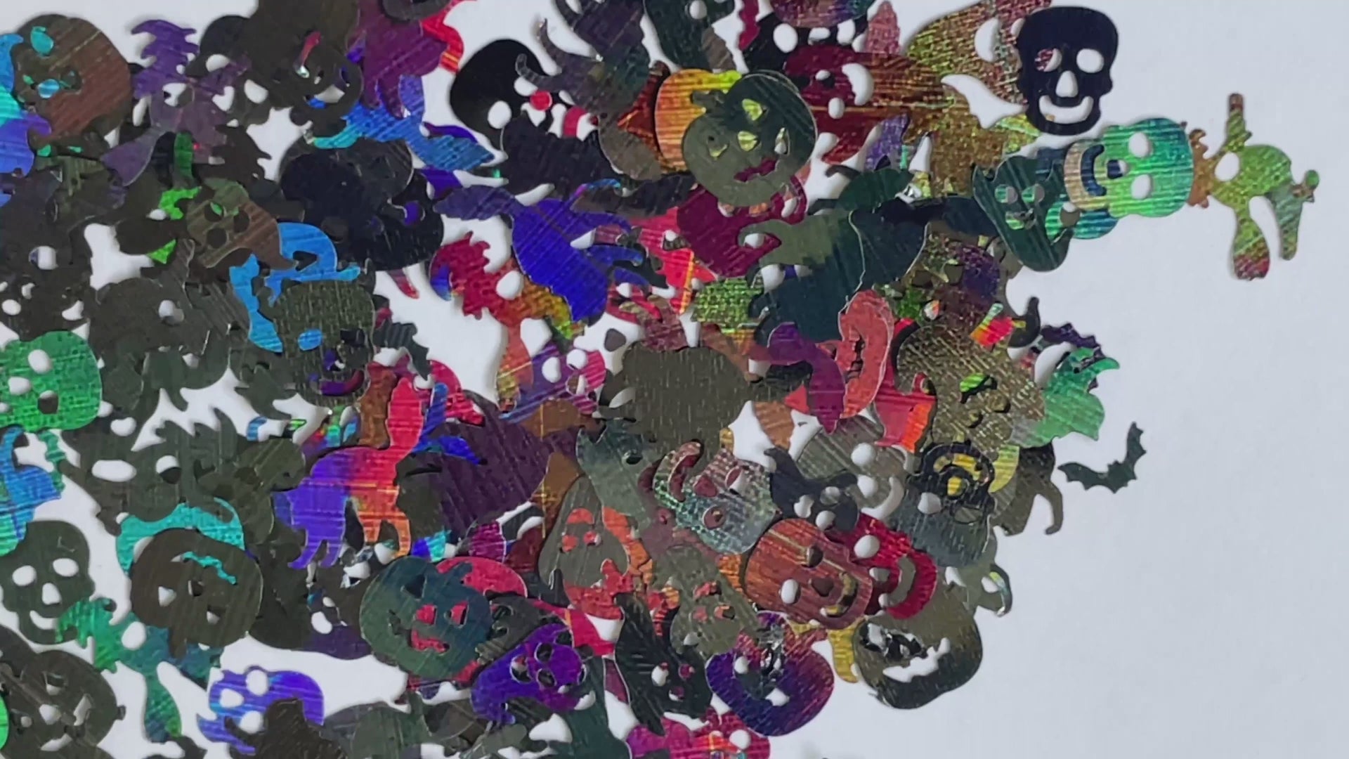 Halloween Mix – Premium Holographic Black Glitter Shapes
Get ready to haunt your look with this eerie blend from our Halloween Collection! Featuring spooky 8mm pumpkins and skulls, 10mm ghosts, 12mm black cats, 6mm bats, and towering 16mm witches, this holographic black mix is perfect for wickedly fun nail art and glitter slime.
Available in 5g jars only.