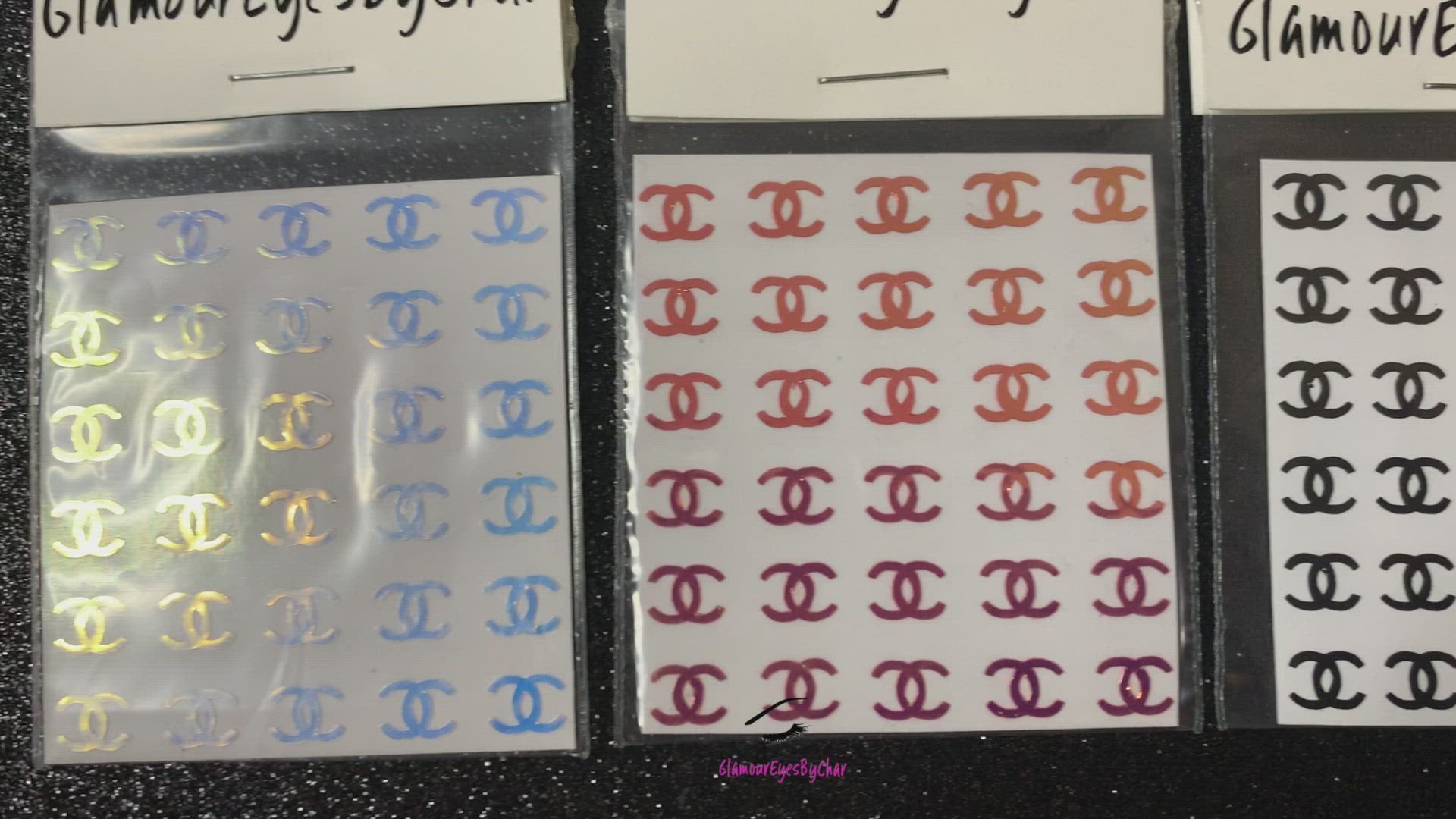 Chanel Inspired Nail Stickers – 30 Pieces (5 Colours)
No need to visit the nail salon—spice up your nails at home with these elegant Chanel designer-inspired nail stickers. Perfect for natural or acrylic nails, you can apply them over regular polish, gel, or shellac. 
Handmade with care, these stickers are great for creating chic nail art or adding flair to fun DIY projects.
🌟 Glam Tip: Apply some of our glitter on your nails to really GLAMOUREYES your look.