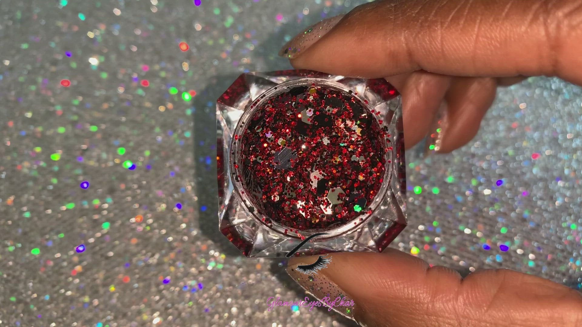 This glitter is called Raptors and is part of the super chunky glitter collection. It consists of ruby red, black, silver, and a touch of gold glitter with a holographic sparkle. If youβre a Toronto Raptors fan, this glitter is perfect for you. Your eyes will stand out in any crowd. Raptors can be used for your face, body, hair and nails. Comes in 5g jars only.