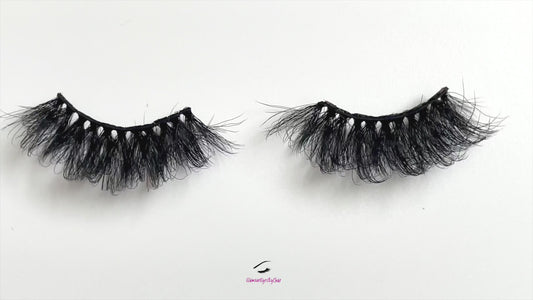 Feisty – 5D Premium Faux Mink Lashes (25mm)
These 5D premium faux mink lashes are 25mm in length—soft, lightweight, and comfortable to wear. With a flexible cotton lash band, application is quick and easy.
Feisty lashes are perfect for dramatic eye looks that make your eyes pop. They’re bold, flirty, and definitely not for timid lash wearers. Each reusable pair can be worn up to 25 times with proper care.
          Every set comes with a cute storage bag and mascara wand