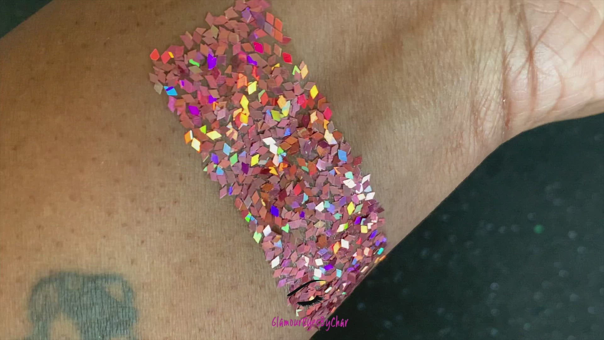 This glitter is called Rose Pink Diamonds and is part of the shaped glitters collection. It consists of rose pink diamond glitter with a dazzling holographic sparkle. Rose Pink Diamonds is perfect for body and nail art or DIY projects. Comes in 5g jars only.
