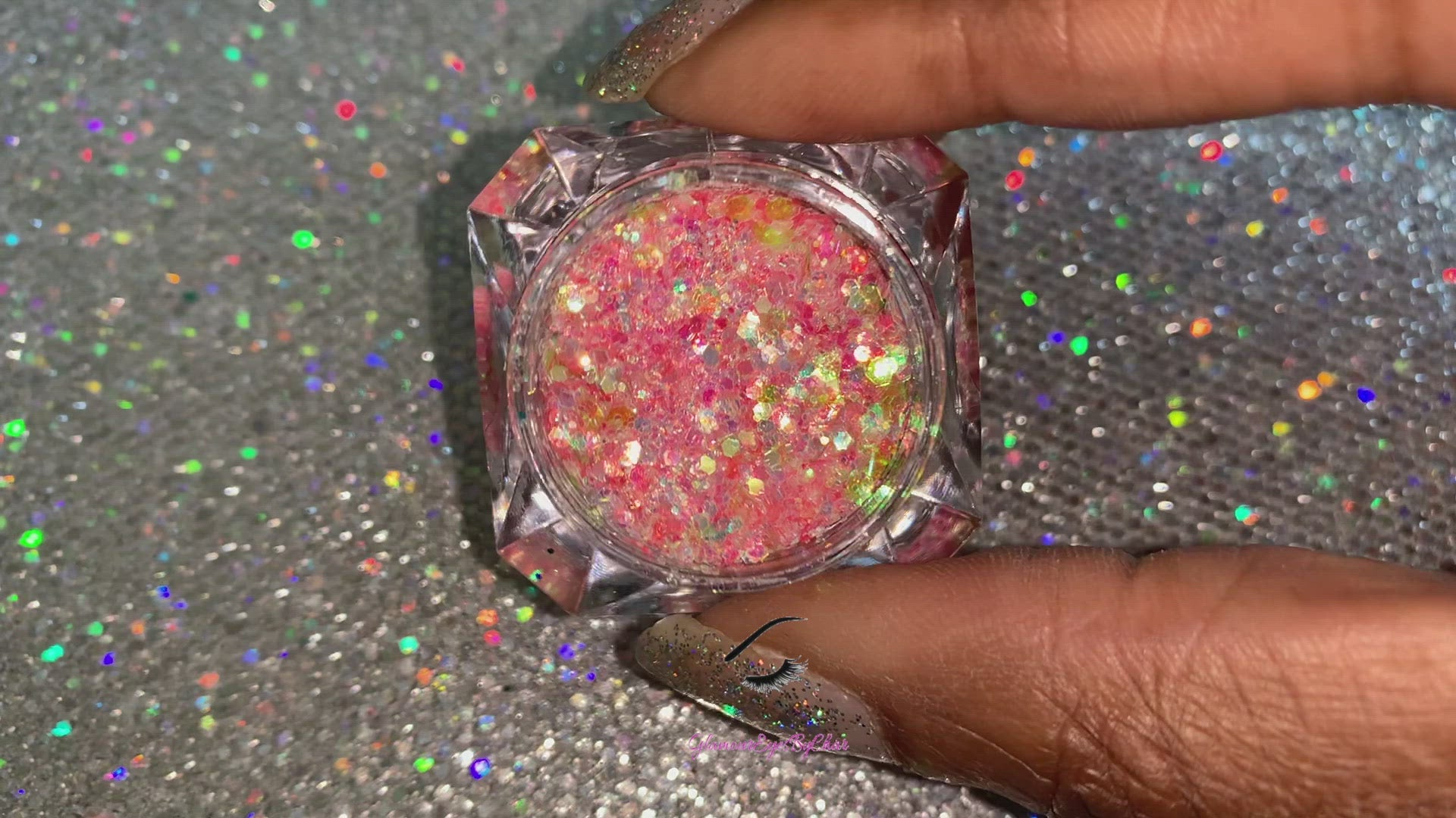 This glitter is called Peach Bellini and is part of the chunky glitter collection. It consists of peach glitter with an iridescent sparkle. Peach Bellini can be used for your face, body, hair and nails. Comes in 5g jars only.