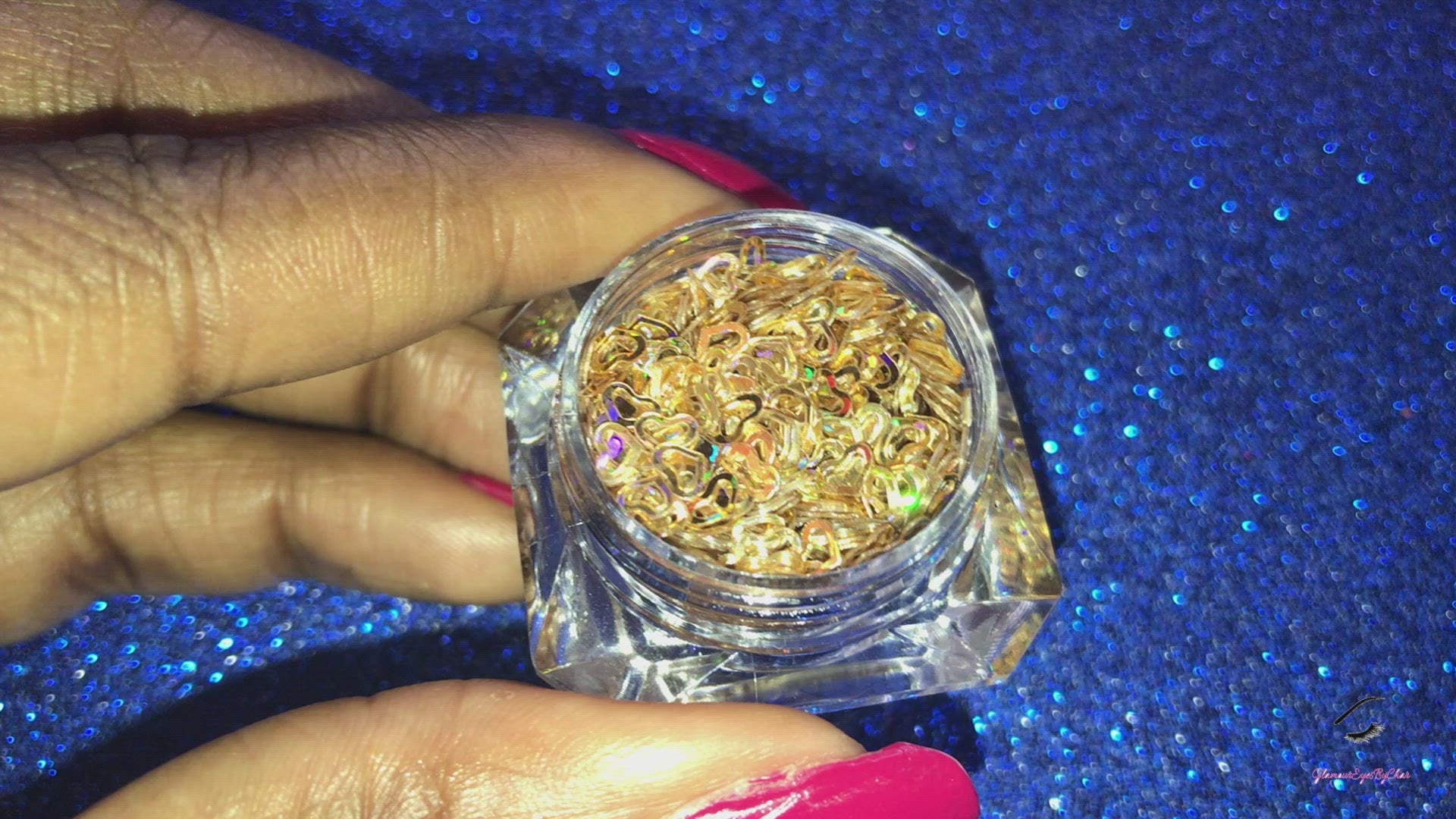 This glitter is called Holographic Gold Hearts and is part of the shaped glitters collection. It consists of gold small and large hearts with a holographic sparkle. Holographic Gold Hearts is perfect for nail and body art.
