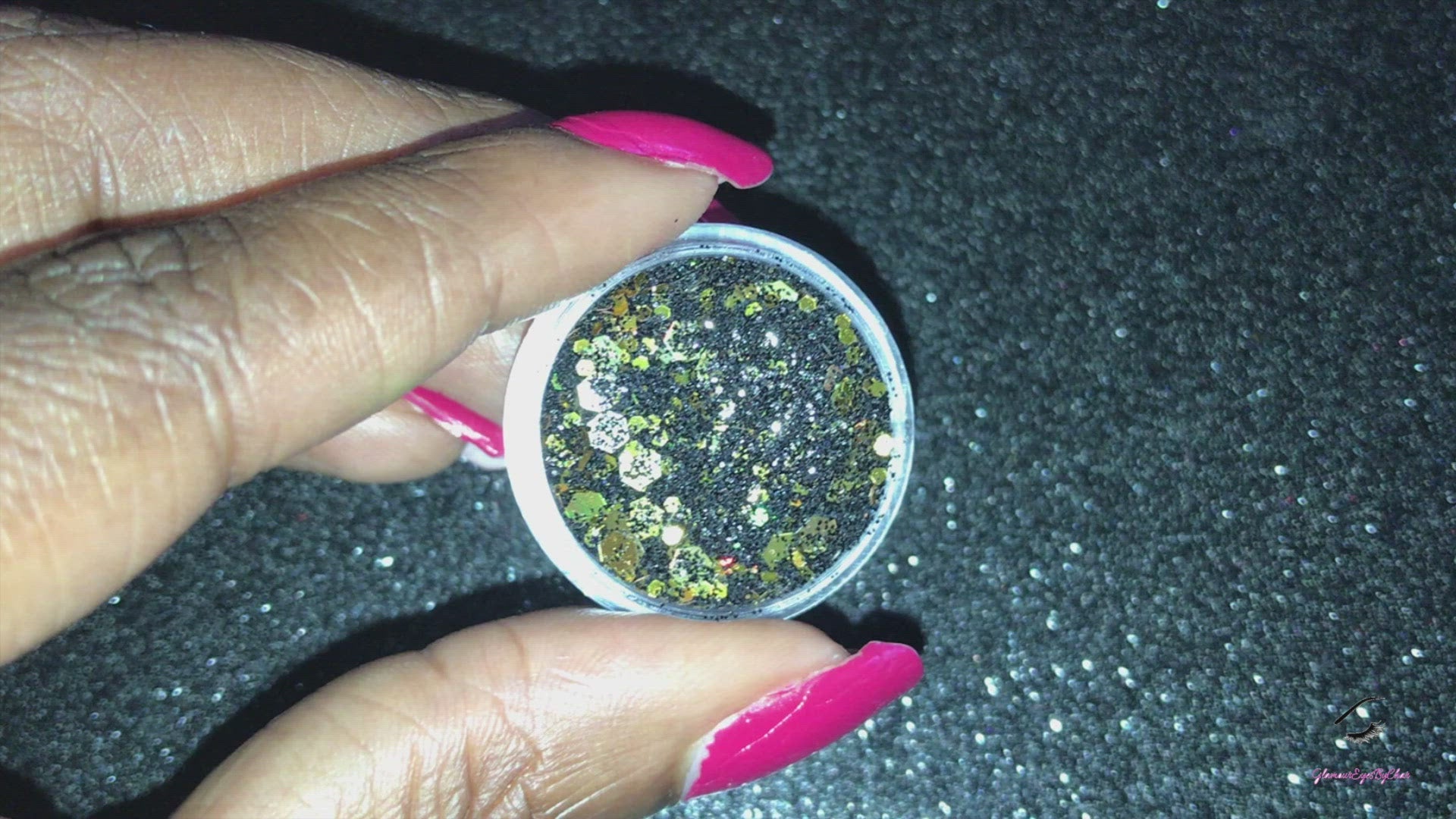 This glitter is called Gold Mine and is part of the super chunky glitter collection.  It consists of black and gold glitter with a holographic dazzling sparkle. Gold Mine can be used for your face, body, hair and nails.  Comes in 5g jars only.