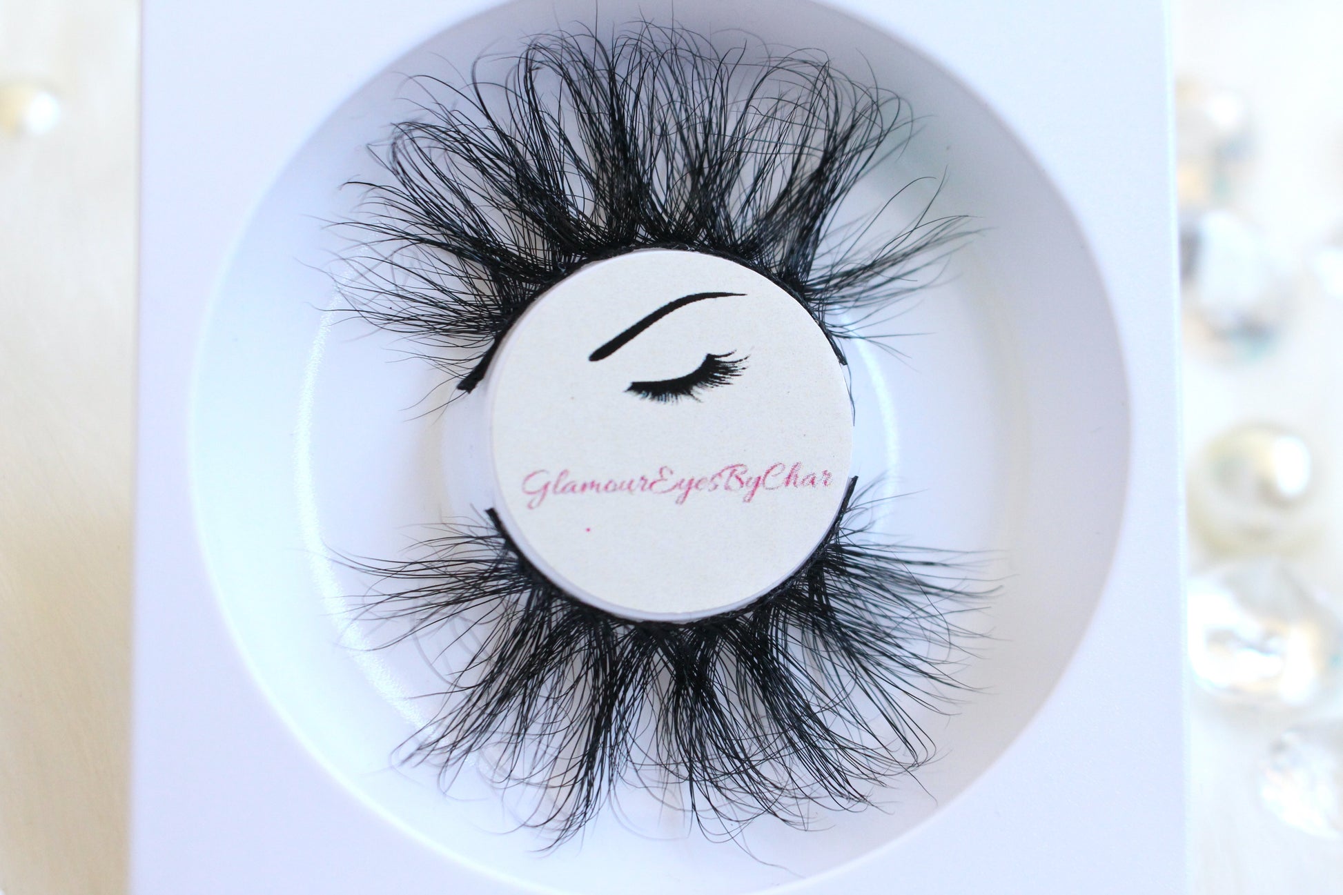 These 5D luxurious mink lashes are called Empress and are 25mm in length. They are dramatic, wispy, have a criss cross style, lightweight, and comfortable to wear on the lids. The thin lashband, makes the application process a breeze.  Empress are suitable for dramatic eye looks and can be worn up to 25 times if handled with care. They will definitely make you feel like the goddess that you are but are not for timid lash wearers. 