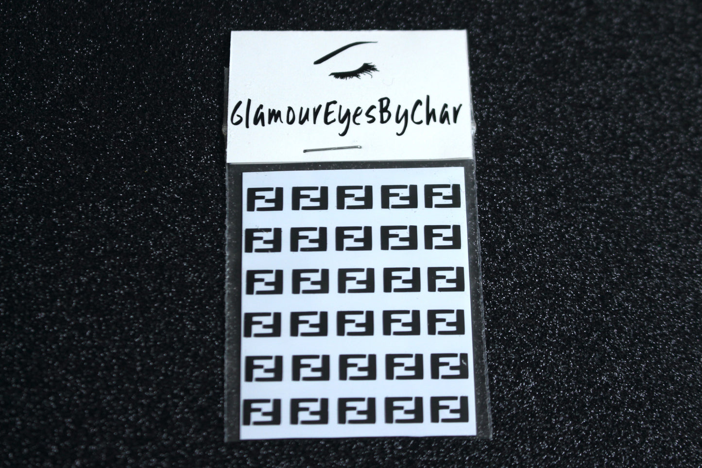 Spice up your nails with these unique FF designer inspired nail decals. They can be used on natural or acrylic nails. You can also apply them on top of regular or gel/shellac nail polish. These handmade decals can also be used for body art or any DIY project. The pack contains 30 decals and is available in 4 different colours. Size: W= 0.3 inches, H= 0.22 inches Tip: Apply some of our glitter on your nails to really GLAMOUREYES your look.