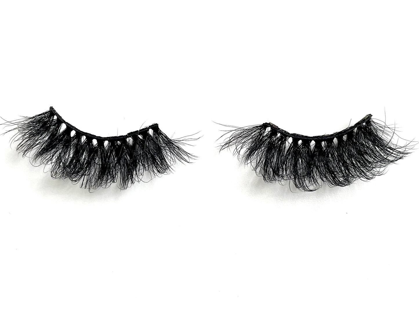Feisty – 5D Premium Faux Mink Lashes (25mm)
These 5D premium faux mink lashes are 25mm in length—soft, lightweight, and comfortable to wear. With a flexible cotton lash band, application is quick and easy.
Feisty lashes are perfect for dramatic eye looks that make your eyes pop. They’re bold, flirty, and definitely not for timid lash wearers. Each reusable pair can be worn up to 25 times with proper care.
Every set comes with a cute storage bag and mascara wand