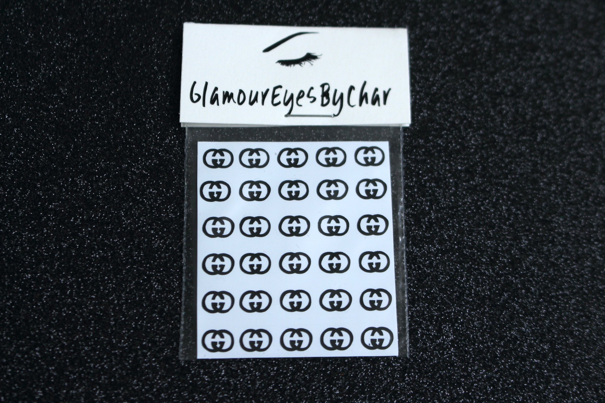 Gucci Inspired Nail Stickers – 30 Pieces (4 Colours)
No need to visit the nail salon—spice up your nails at home with these bold Gucci designer-inspired nail stickers. Perfect for natural or acrylic nails, you can apply them over regular polish, gel, or shellac. 
Handmade with care, these stickers are great for creating chic nail art or adding flair to fun DIY projects.