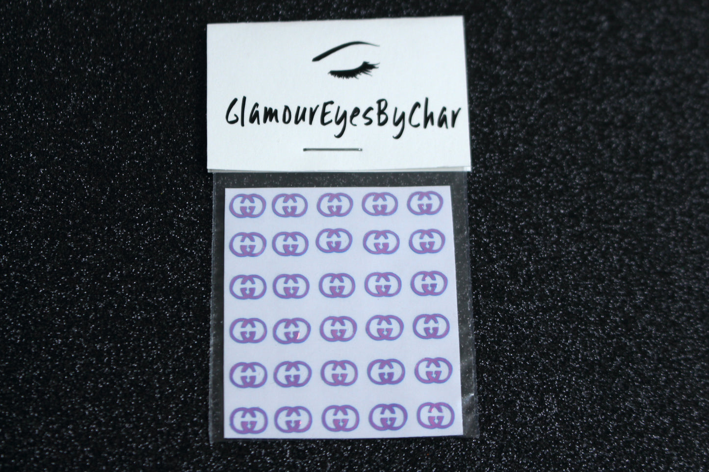 Gucci Inspired Nail Stickers – 30 Pieces (4 Colours)
No need to visit the nail salon—spice up your nails at home with these bold Gucci designer-inspired nail stickers. Perfect for natural or acrylic nails, you can apply them over regular polish, gel, or shellac.
Handmade with care, these stickers are great for creating chic nail art or adding flair to fun DIY projects.