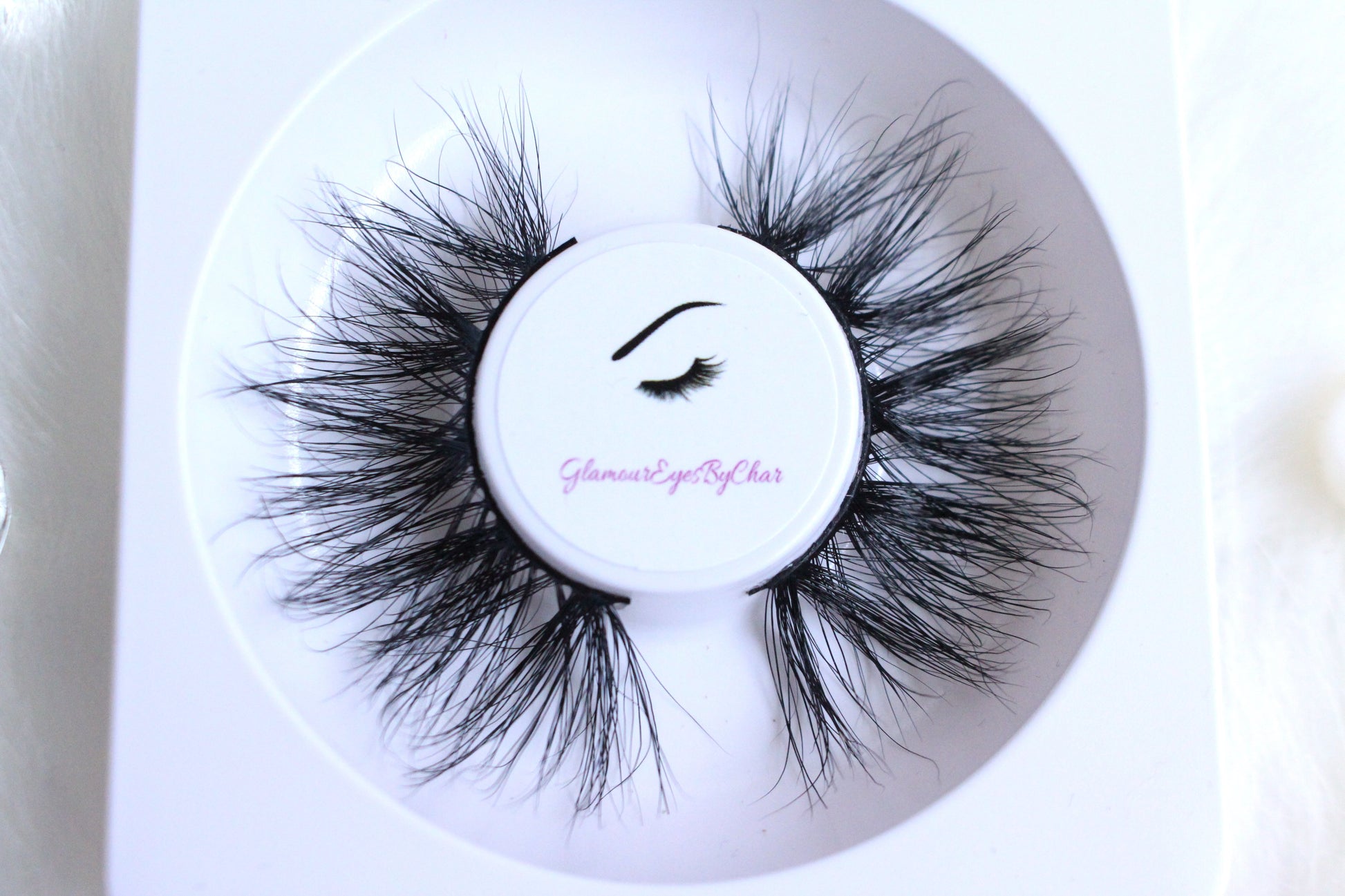 These 5D luxurious mink lashes are called Goddess and are 25mm in length. They are very dramatic, wispy, have a criss cross style, and comfortable to wear on the lids. The thin lashband, makes the application process a breeze.  Goddess are suitable for dramatic eye looks and can be worn up to 25 times if handled with care.