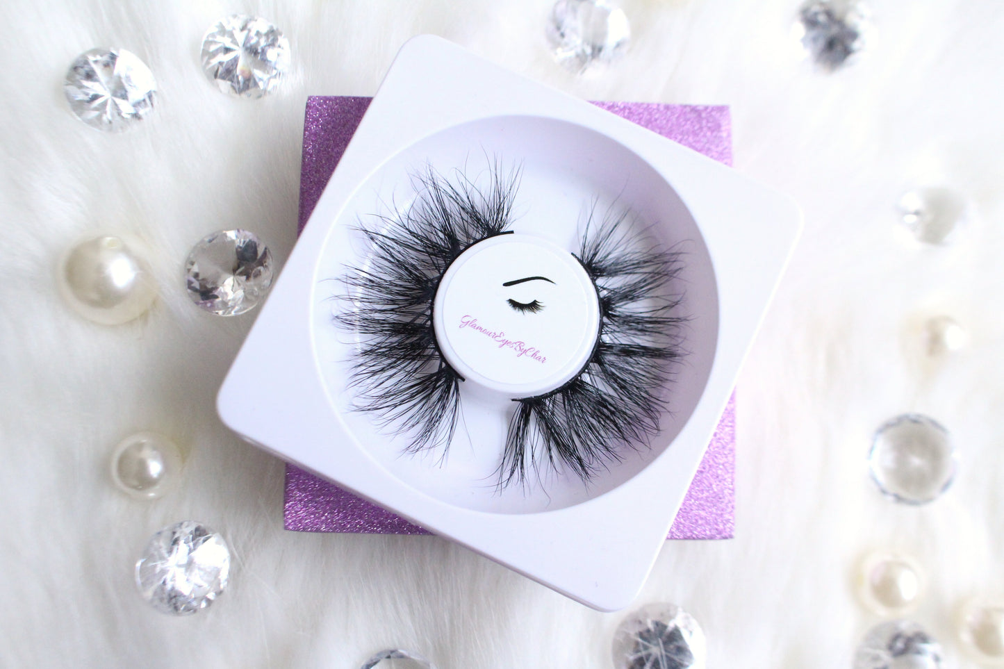 These 5D luxurious mink lashes are called Goddess and are 25mm in length. They are very dramatic, wispy, have a criss cross style, and comfortable to wear on the lids. The thin lashband, makes the application process a breeze. Goddess are suitable for dramatic eye looks and can be worn up to 25 times if handled with care.
