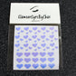 No need to go to the nail salon. Spice up your nails at home with these cute heart nail decals. They can be used on natural or acrylic nails. You can also apply them on top of regular or gel/shellac nail polish. These handmade decals can also be used for body art or any DIY project. Each pack contains 60 decals and is available in 4 different colours.  The pack also includes 4 different sizes so that you can mix and match.  Tip: Apply some of our glitter on your nails to really GLAMOUREYES your look.