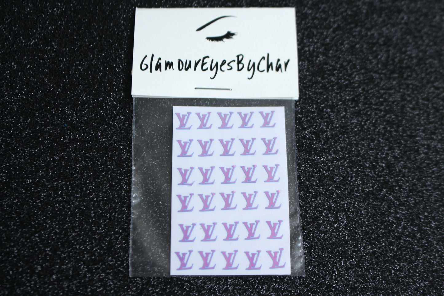 Louis Vuitton Inspired Nail Stickers – 30 Pieces (5 Colours)
No need to visit the nail salon—spice up your nails at home with these chic Louis Vuitton designer-inspired nail stickers. Perfect for natural or acrylic nails, you can apply them over regular polish, gel, or shellac.
Handmade with care, these stickers are great for creating chic nail art or adding flair to fun DIY projects.
🌟 Glam Tip: Apply some of our glitter on your nails to really GLAMOUREYES your look.