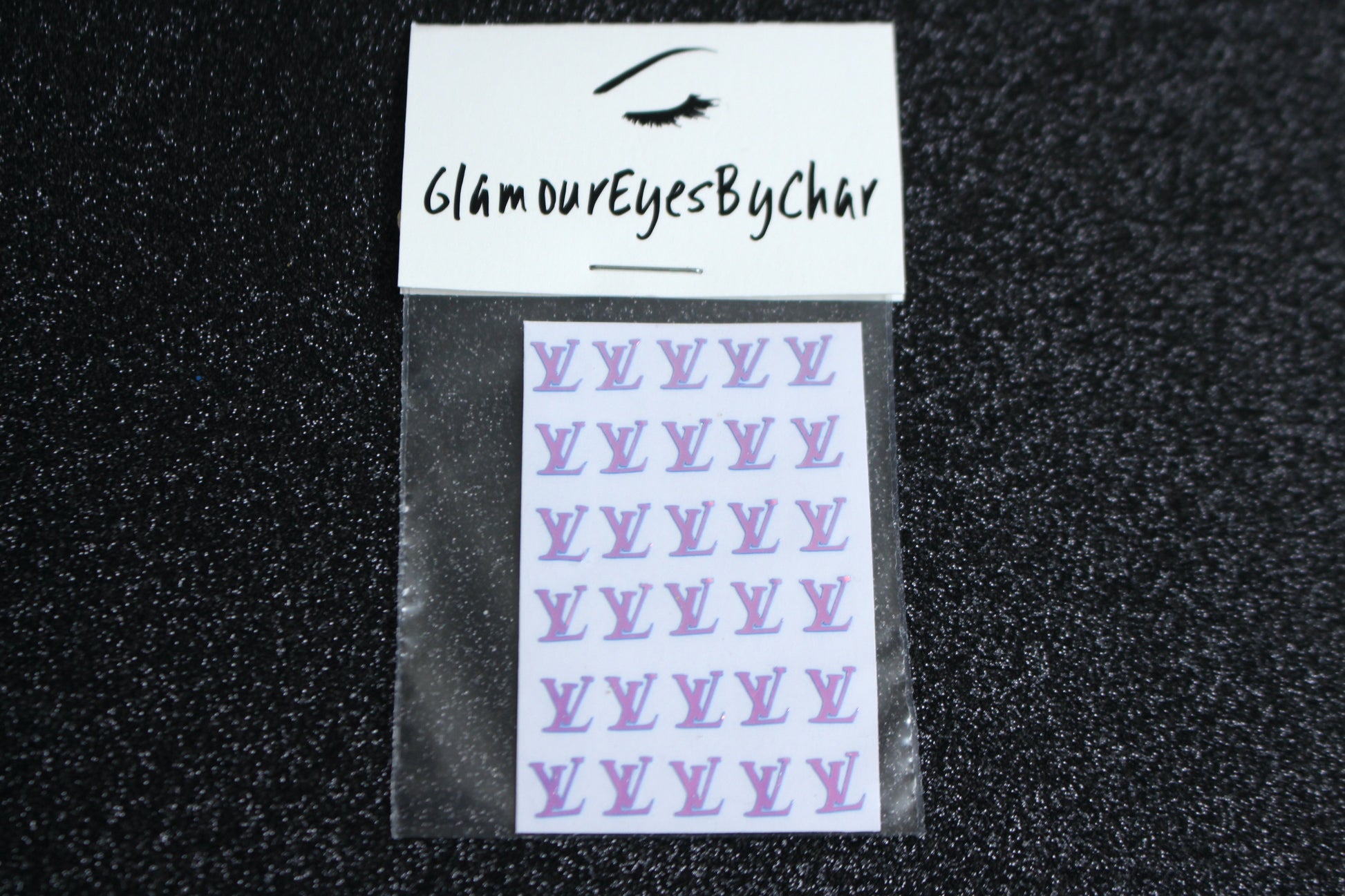 Louis Vuitton Inspired Nail Stickers – 30 Pieces (5 Colours)
No need to visit the nail salon—spice up your nails at home with these chic Louis Vuitton designer-inspired nail stickers. Perfect for natural or acrylic nails, you can apply them over regular polish, gel, or shellac. 
Handmade with care, these stickers are great for creating chic nail art or adding flair to fun DIY projects.
🌟 Glam Tip: Apply some of our glitter on your nails to really GLAMOUREYES your look.