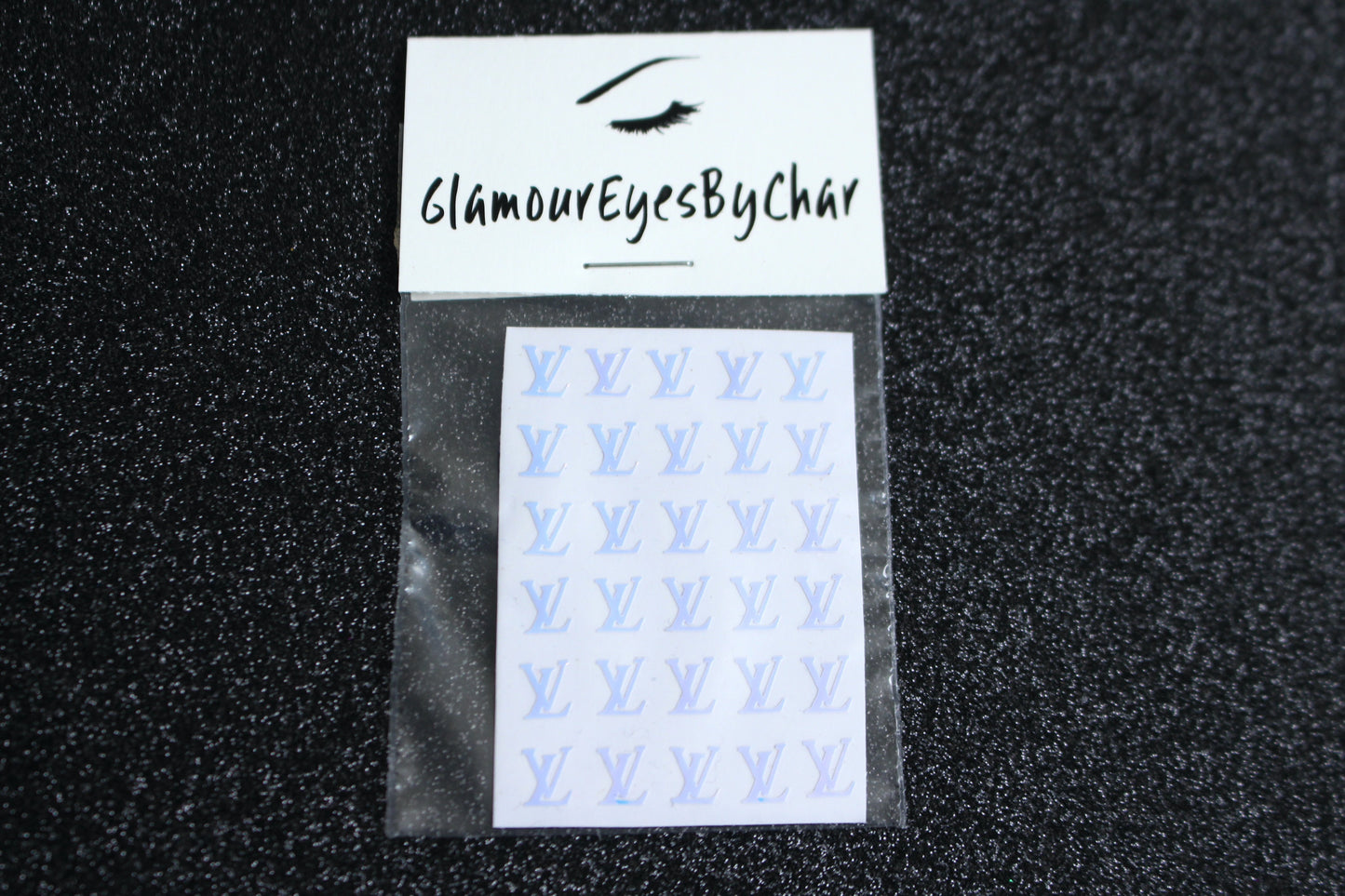 Louis Vuitton Inspired Nail Stickers – 30 Pieces (5 Colours)
No need to visit the nail salon—spice up your nails at home with these chic Louis Vuitton designer-inspired nail stickers. Perfect for natural or acrylic nails, you can apply them over regular polish, gel, or shellac.
Handmade with care, these stickers are great for creating chic nail art or adding flair to fun DIY projects.
🌟 Glam Tip: Apply some of our glitter on your nails to really GLAMOUREYES your look.