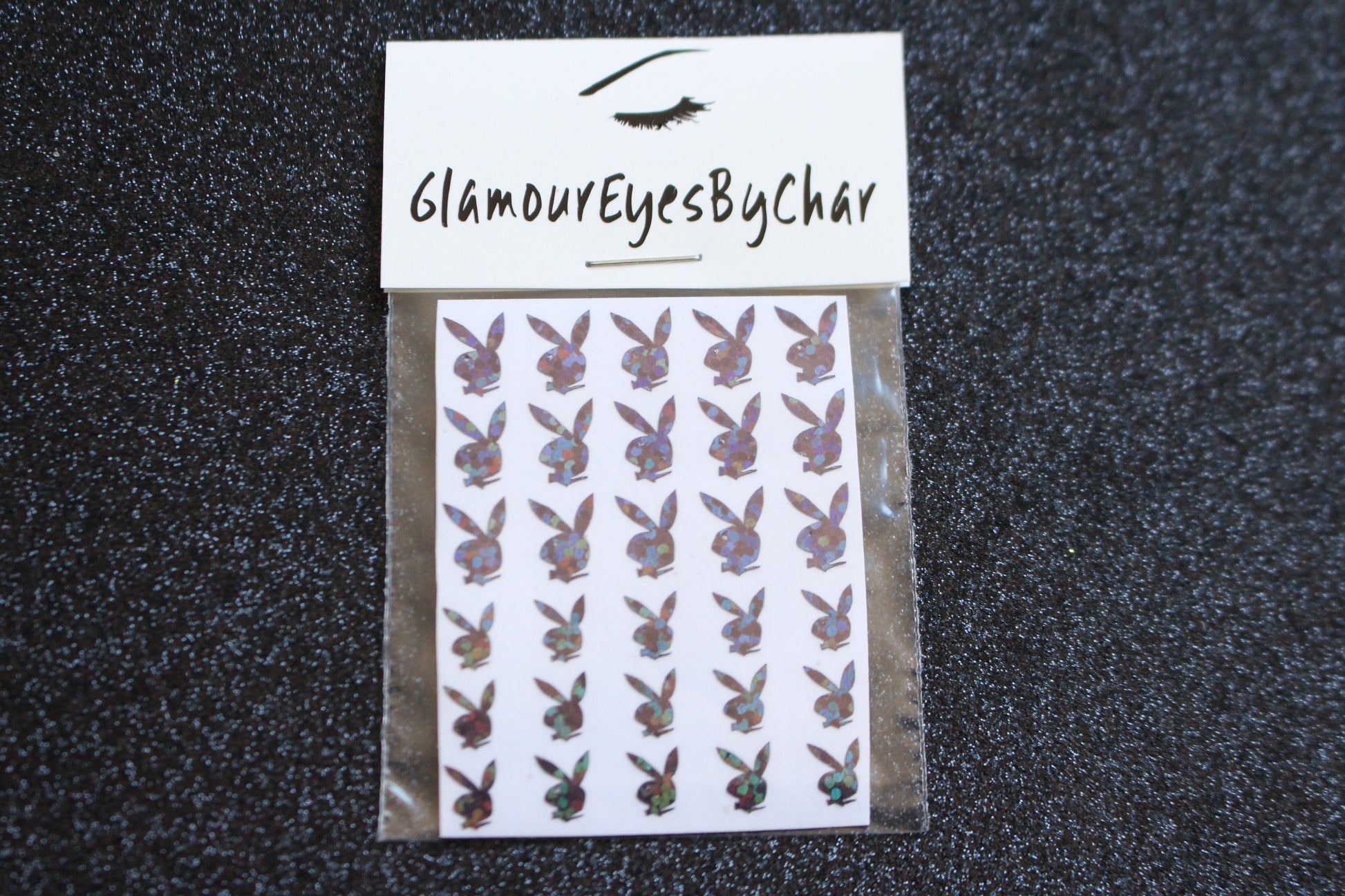 Playboy Bunny Inspired Nail Stickers – 30 Pieces (6 Colours)
Part of our Nail Sticker Collection, these bold Playboy Bunny inspired nail stickers are perfect for spicing up your nails at home. Whether on natural or acrylic nails, they can also be applied over regular polish, gel, or shellac. Handmade with care, these stickers are great for creating playful nail art or adding flair to fun DIY projects. Each pack includes 2 different sizes for easy mixing and matching.