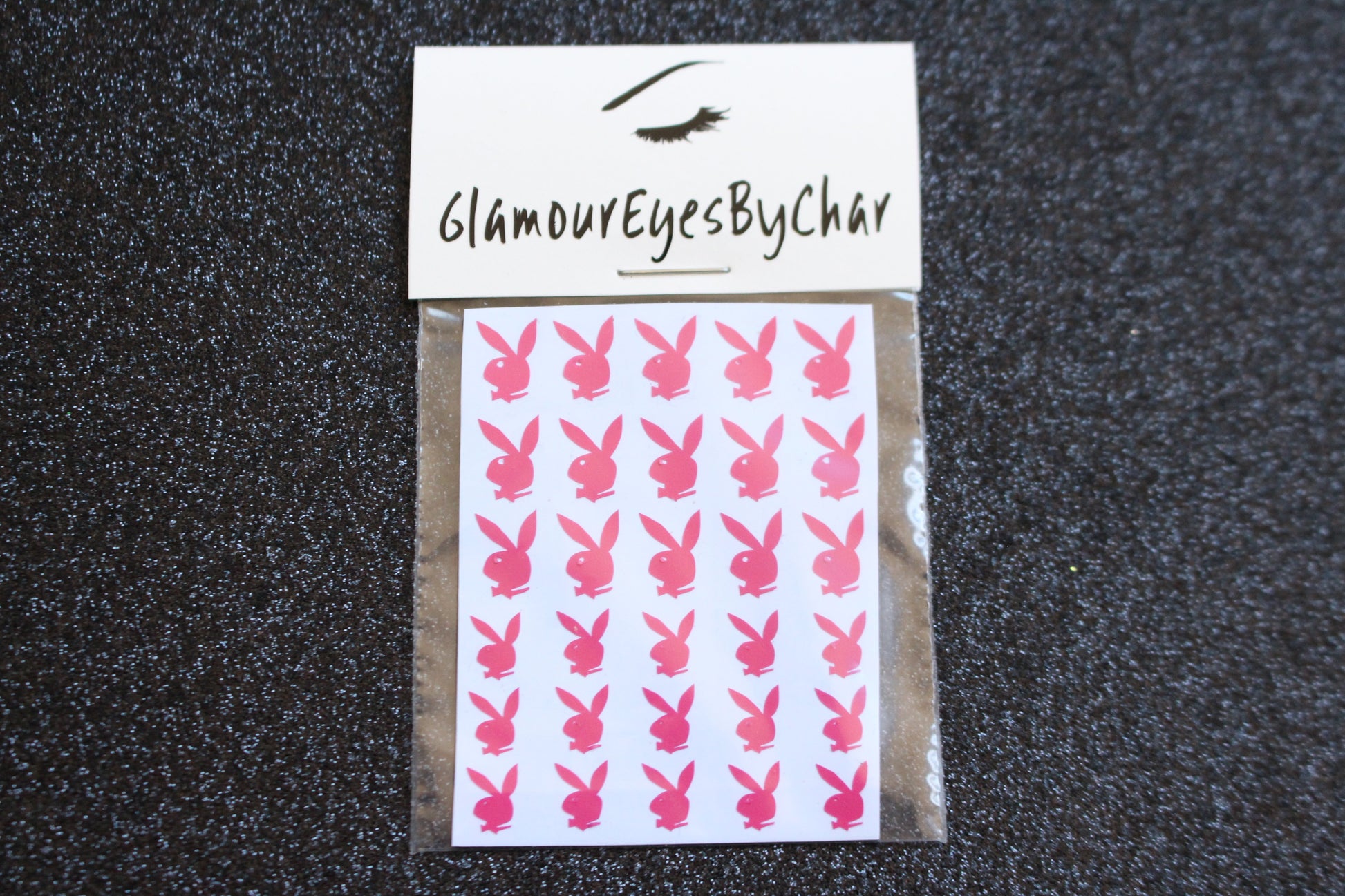 Playboy Bunny Inspired Nail Stickers – 30 Pieces (6 Colours)
Part of our Nail Sticker Collection, these bold Playboy Bunny inspired nail stickers are perfect for spicing up your nails at home. Whether on natural or acrylic nails, they can also be applied over regular polish, gel, or shellac. Handmade with care, these stickers are great for creating playful nail art or adding flair to fun DIY projects. Each pack includes 2 different sizes for easy mixing and matching.