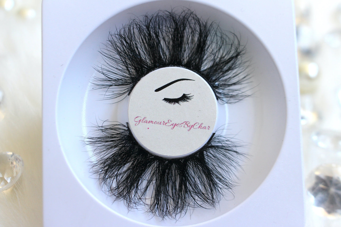 These 5D luxurious mink lashes are called Royalty and are 25mm in length. They are very dramatic, wispy, have a criss cross style, lightweight, and comfortable to wear on the lids. The thin lashband, makes the application process a breeze. Royalty are suitable for dramatic eye looks and can be worn up to 25 times if handled with care. They will definitely make you feel like the goddess that you are but are not for timid lash wearers.