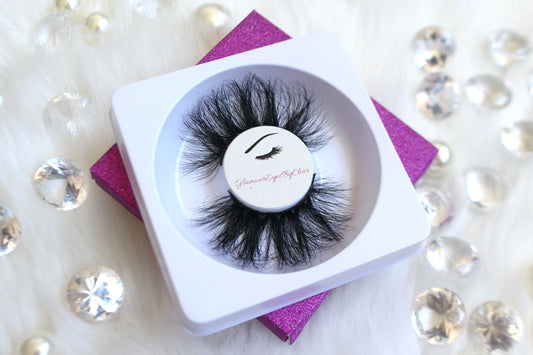These 5D luxurious mink lashes are called Royalty and are 25mm in length. They are very dramatic, wispy, have a criss cross style, lightweight, and comfortable to wear on the lids. The thin lashband, makes the application process a breeze.  Royalty are suitable for dramatic eye looks and can be worn up to 25 times if handled with care. They will definitely make you feel like the goddess that you are but are not for timid lash wearers.