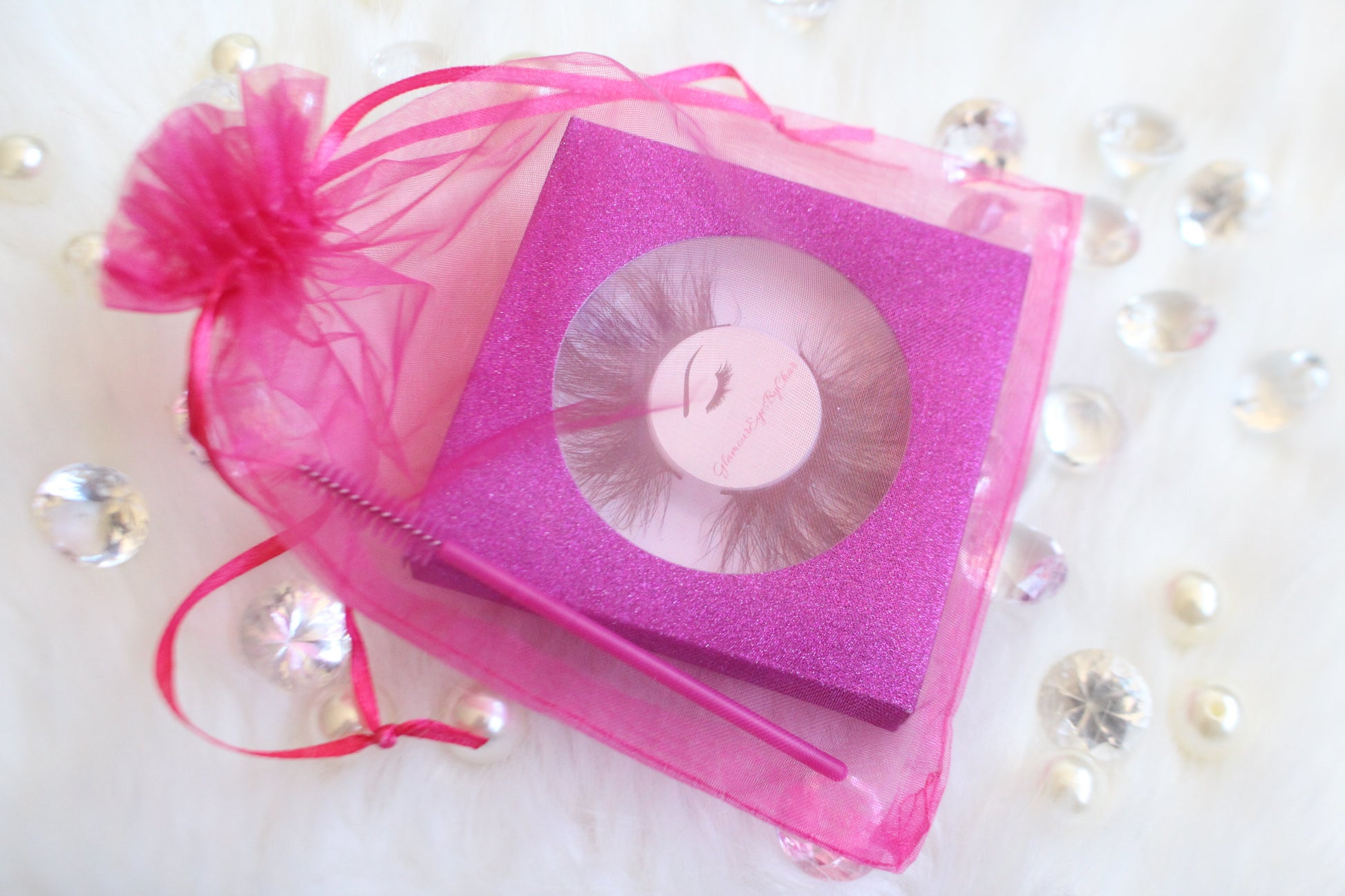 These 5D luxurious mink lashes are called Royalty and are 25mm in length. They are very dramatic, wispy, have a criss cross style, lightweight, and comfortable to wear on the lids. The thin lashband, makes the application process a breeze.  Royalty are suitable for dramatic eye looks and can be worn up to 25 times if handled with care. They will definitely make you feel like the goddess that you are but are not for timid lash wearers.