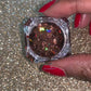 This glitter is called Brown Sugar and is part of the super chunky glitter collection.  It consists of chocolate brown holographic glitter. Brown Sugar can be used for your face, body, hair and nails.  Comes in 5g jars only.