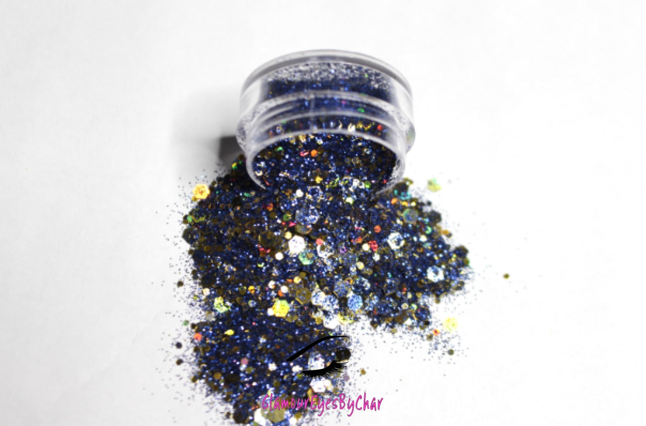 This glitter is called Barbados 🇧🇧 and is part of the super chunky glitter collection.  It consists of royal blue and gold glitter with a dazzling holographic sparkle. Barbados can be used for your face, body, hair and nails. Comes in 5g jars only.