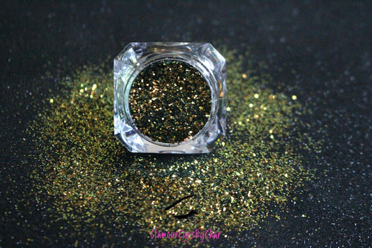Beautiful Nightmare โ Premium Olive Green and Gold Glitter
Part of our Simple Glitter Collection, this premium glitter features olive green tones with rich golden reflections that give off a dramatic, edgy vibe. Beautiful Nightmare can be used for all your creative looks, nail art, hair, and glitter slime.
Available in 5g jars only.