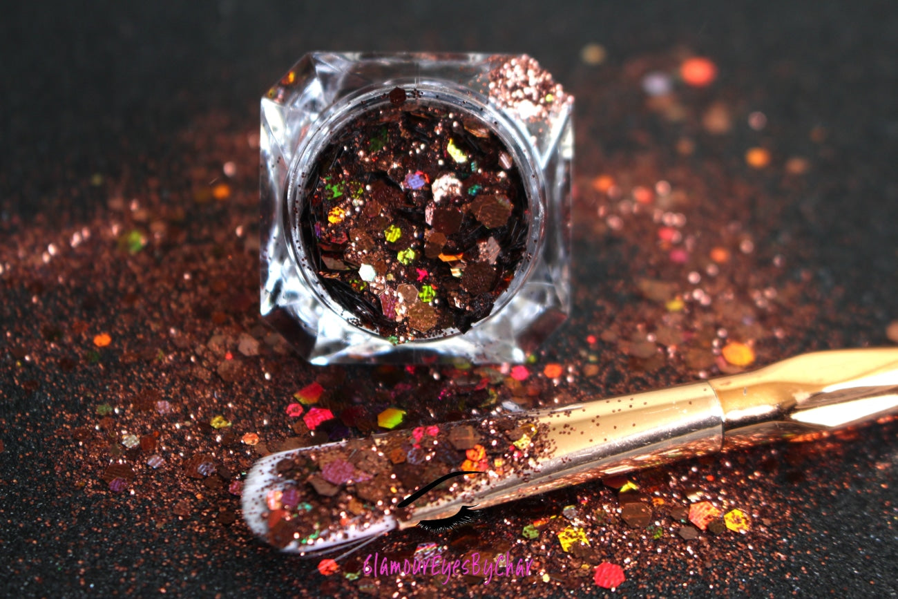 This glitter is called Brown Sugar and is part of the super chunky glitter collection. It consists of chocolate brown holographic glitter. Brown Sugar can be used for your face, body, hair and nails. Comes in 5g jars only.