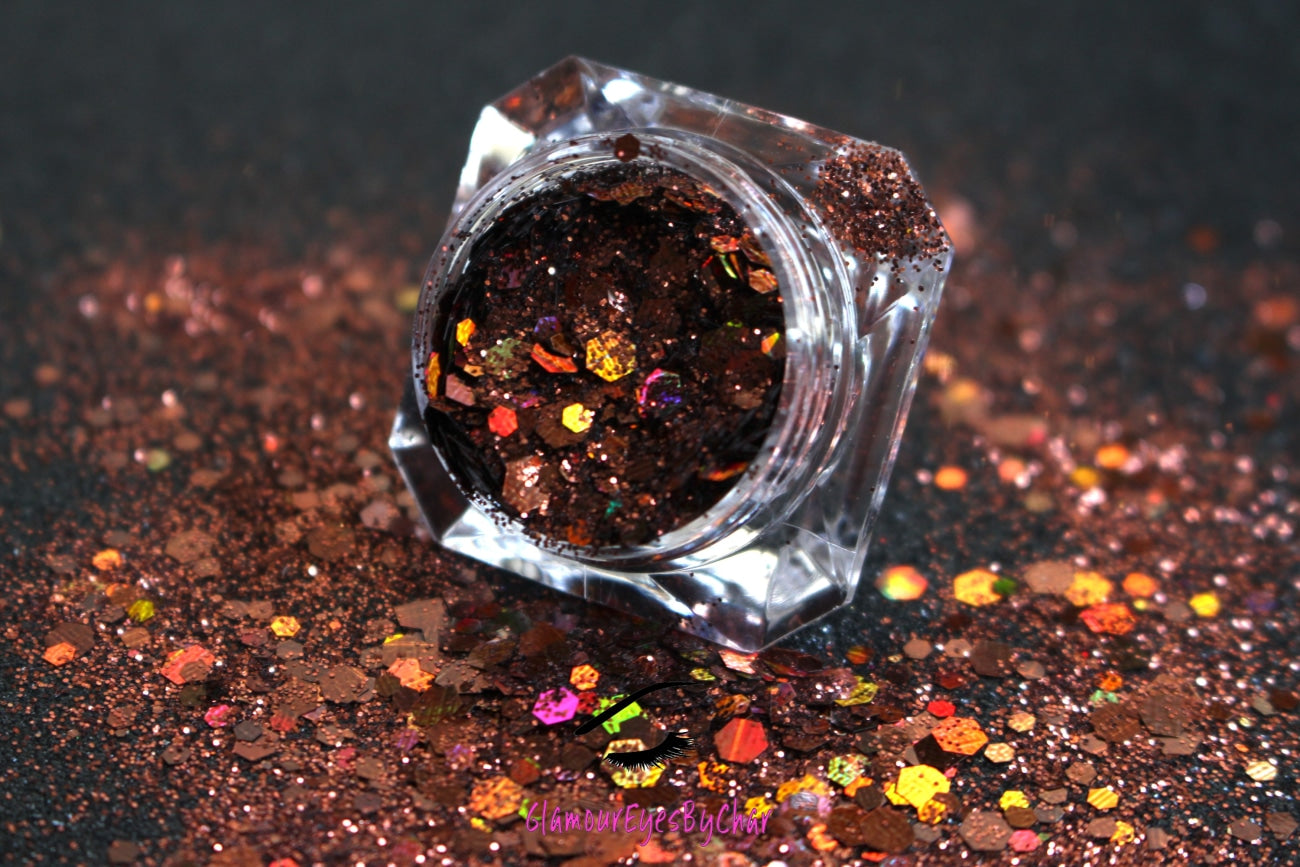This glitter is called Brown Sugar and is part of the super chunky glitter collection.  It consists of chocolate brown holographic glitter. Brown Sugar can be used for your face, body, hair and nails.  Comes in 5g jars only.