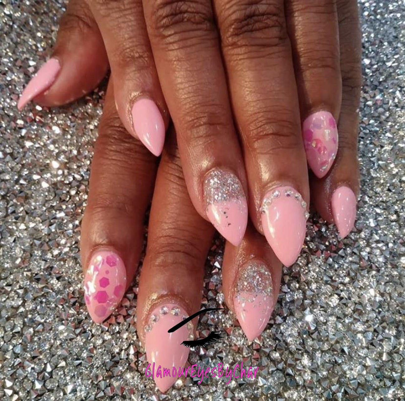 This glitter is called Candy Shop and is part of the super chunky glitter collection.  It consists of fuchsia glitter with an iridescent sparkle. Candy Shop can be used for your face, body, hair and nails.  Comes in 5g jars only.