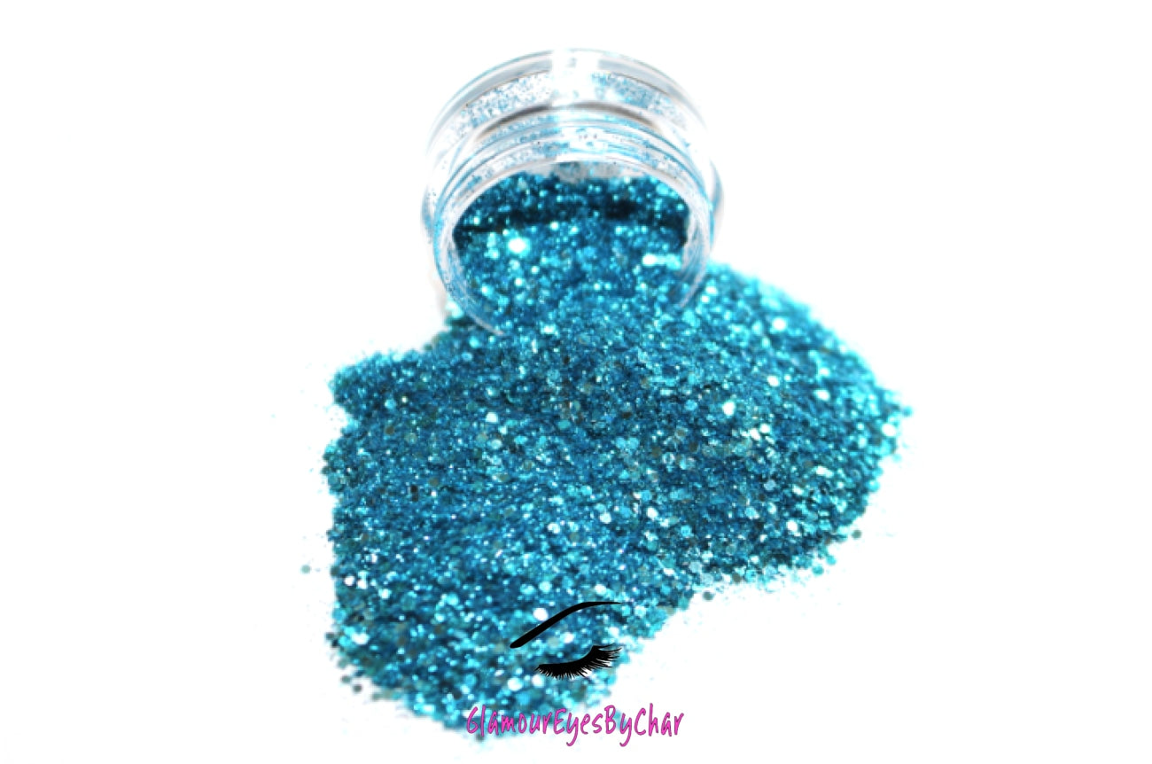 This glitter is called Caribbean Sea and is part of the chunky glitter collection. It consists of aqua blue metallic glitter and has a dazzling sparkle. Caribbean Sea can be used for your face, body, hair and nails. Comes in 5g and 10g jars.