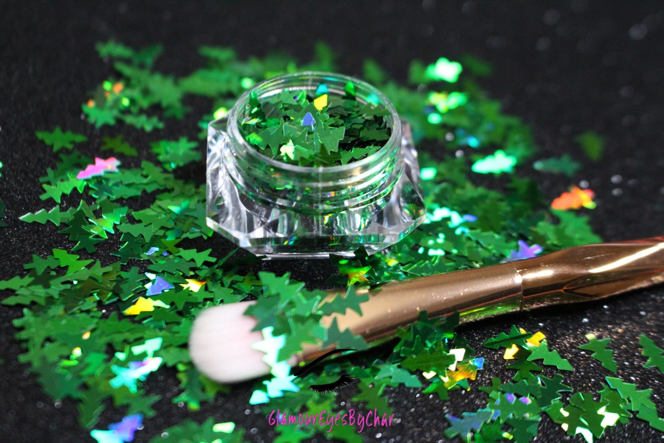 Christmas Trees โ Premium 8mm Holographic Green Glitter Shapes
Part of our Holiday Collection, these festive 8mm green Christmas trees add cheerful sparkle to your nail art and glitter slime.
Available in 5g jars only.