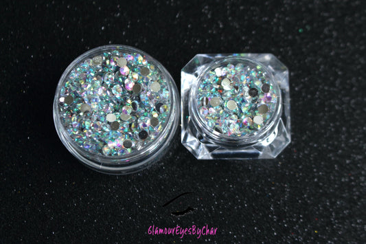 Clear AB Rhinestones – Flatback Resin (2mm & 3mm)
Part of our Glamour Goodies Collection, these clear AB flatback resin rhinestones are perfect for adding extra sparkle to your nails or any creative project. With a brilliant shimmer that catches the light, they bring just the right touch of glam wherever you use them.
Stone size: 2mm and 3mm
Available in 5g and 10g jars.
Note: 10g jars are round and not diamond shaped. Rhinestones are sold by weight and not individually counted.
