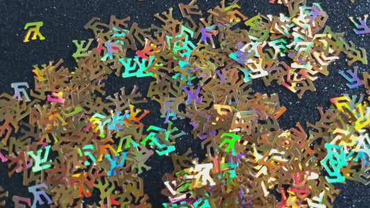 LV Glitter – Premium Louis Vuitton-Inspired Holographic Gold Letters
Part of our Shaped Glitter Collection, these unique holographic gold LV letters add a luxe designer-inspired touch to your nail art and glitter slime.
Available in 5g jars only.