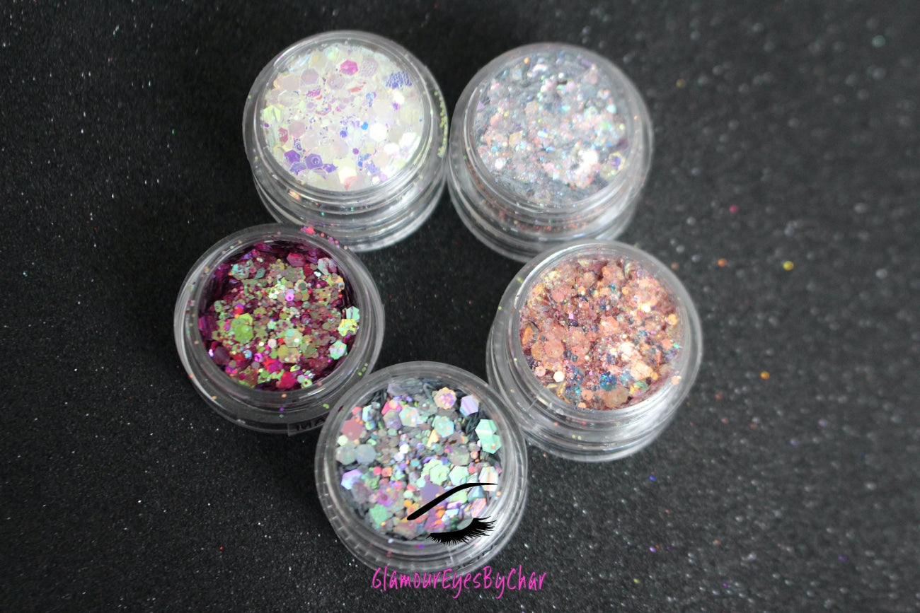The Dreamland stacker is comprised of dazzling glitters from the super chunky collection. These glitters are perfect for an eye catching look for a night out on the town. The glitters in this set are as follows: Galaxy Illusion She's Perfect Looking Glass Masquerade The Dreamland stacker can be used for your face, body, hair and nails. Available in 5g jars only.