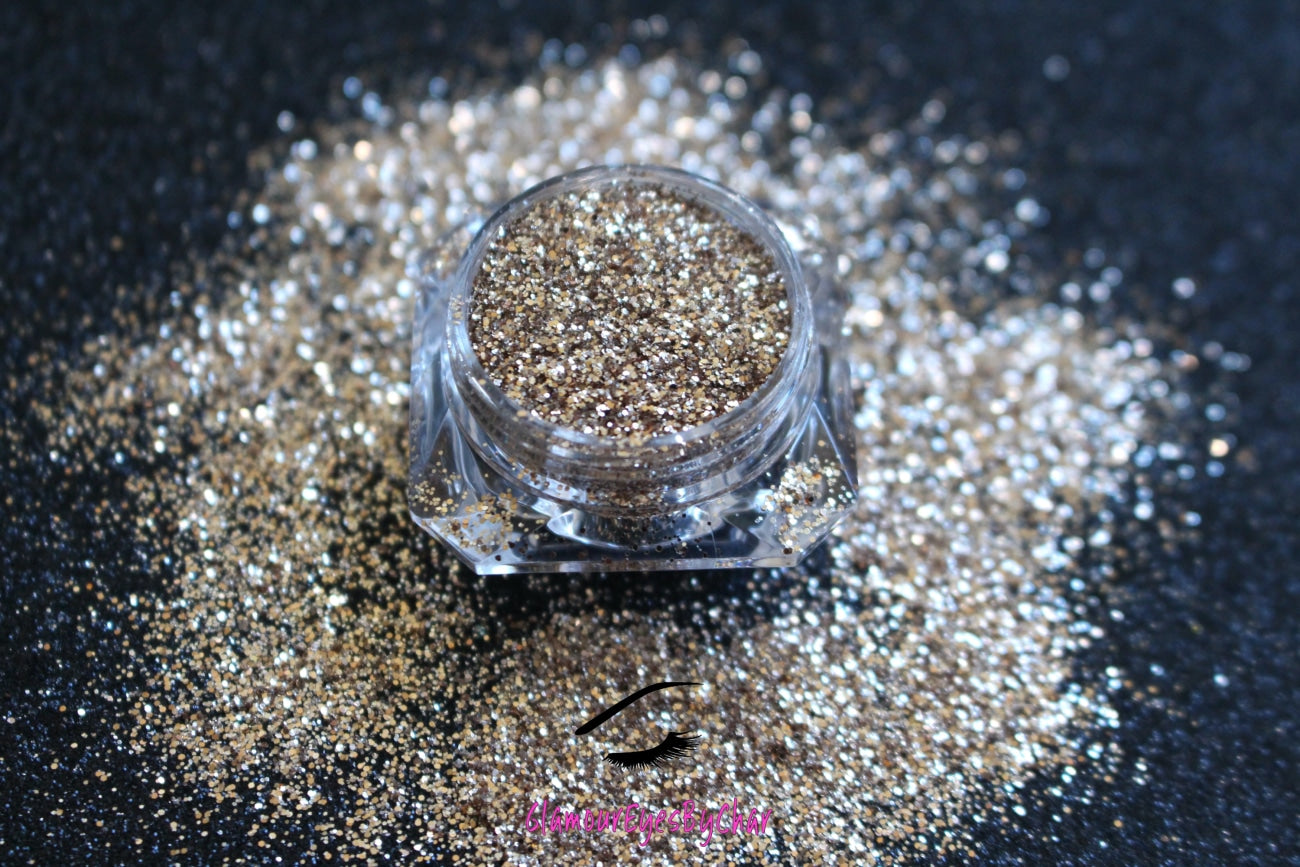 This glitter is called Exquisite and is part of the simple glitter collection. It consists of dark champagne and pale gold glitter with a metallic sparkle. Exquisite can be used for your face, body, hair and nails. Comes in 5g jars only.