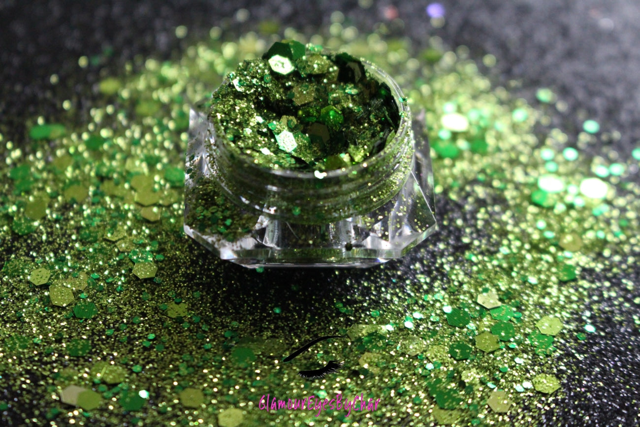 This glitter is called I'm Feeling Lucky and is part of the super chunky glitter collection.  It consists of pesto green glitter with a touch of gold. I'm Feeling Lucky can be used for your face, body, hair and nails.  Comes in 5g jars only. **Glitter will be discontinued once sold out**