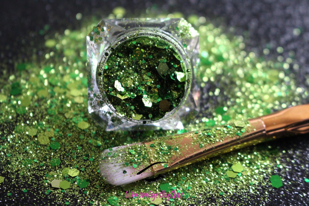This glitter is called I'm Feeling Lucky and is part of the super chunky glitter collection.  It consists of pesto green glitter with a touch of gold. I'm Feeling Lucky can be used for your face, body, hair and nails.  Comes in 5g jars only. **Glitter will be discontinued once sold out**