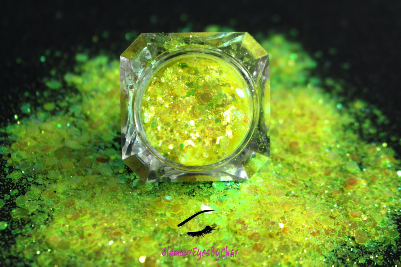 This glitter is called Lemon Lime and is part of the super chunky glitter collection. It consists of fluorescent iridescent green glitter that may look yellow depending on how the light reflects. Lemon Lime can be used for your face, hair, body and nail art, glitter slime, resin art or DIY projects. Comes in 5g jars only.