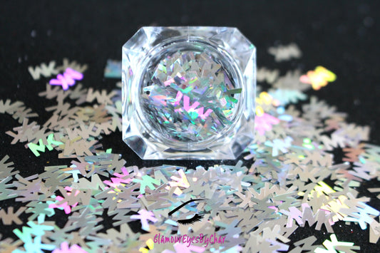 MK Glitter – Premium Michael Kors-Inspired Holographic Silver Letters
Part of our Shaped Glitter Collection, these unique holographic silver MK letters add a chic designer-inspired flair to your nail art and glitter slime.
Available in 5g jars only.