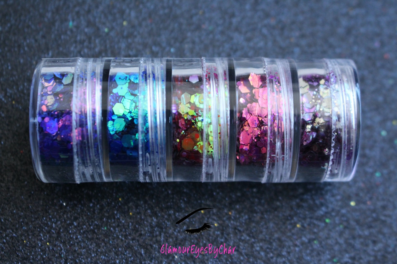 The Party Girl stacker is comprised of glitters from the super chunky collection. These glitters are perfect for an eye catching look for a night out on the town. The glitters in this set are as follows: Daydream Fantasy Mardi Gras Deep Sea Hypnotic   The Party Girl stacker can be used for your face, body, hair and nails. Available in 5g jars only.