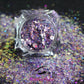 This glitter is called Pastel Vibes and is part of the super chunky glitter collection. It consists of purple glitter with a rose gold unique colour shifting sparkle. Pastel Vibes can be used for your face, hair, body and nail art, glitter slime, resin art or DIY projects.  Comes in 5g jars only.