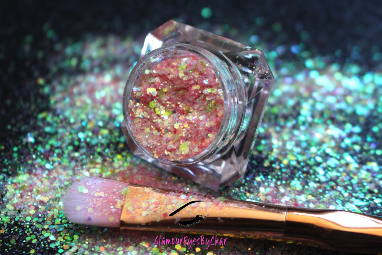 This glitter is called Peach Bellini and is part of the chunky glitter collection. It consists of peach glitter with an iridescent sparkle. Peach Bellini can be used for your face, body, hair and nails. Comes in 5g jars only.
